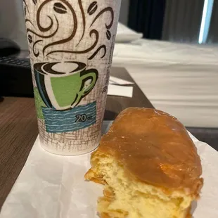 Donut and hot dark roast coffee
