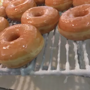 glazed donuts on a cooling rack