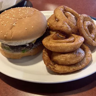 Basic &quot; Cheeseburger with everything. The burger tastes steak grade. Absolutely Delicious!  &amp; Beer Battered Onion Rings!