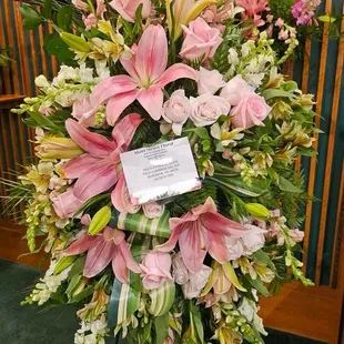 Elegant Embrace Standing Spray arrangement. Beautiful!