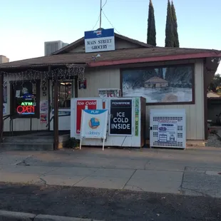 signs and advertisements on the side of the building