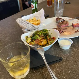 Ribeye steak , Glenlivet, and a very Cold Stella Artois.  Always amazing food, service and all the people!