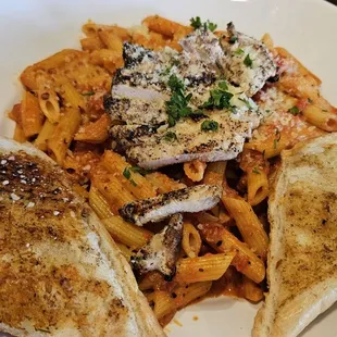 Penne alla Vodka Pasta had a pink sauce that was not bad. The chicken was somewhat dry.