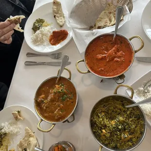 Lamb Vindaloo, butter chicken, palak paneer (spinach with cheese) and garlic naan