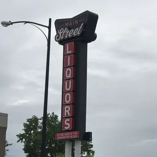 sign for main street liquors