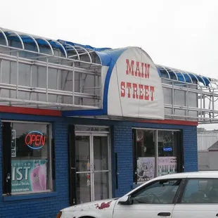 a car parked in front of the building