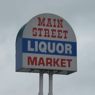 sign for main street liquor market