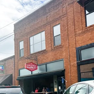 a car parked in front of the building