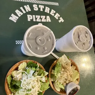 Main Street green tables with our drinks and salads