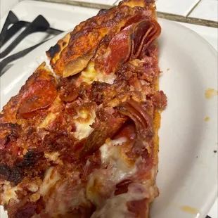 Sausage, pepperoni and cheese pizza.