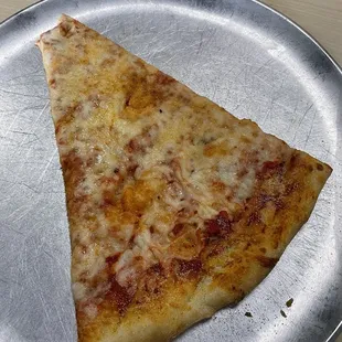 The pizza was crispy yet chewing cheese was delicious and sauce is tasty.