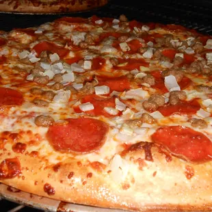 Rolling Out of the Oven! Pepperoni, Sausage, Onion! Yum!