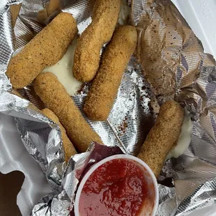 Mozzarella cheese sticks with marinara sauce
