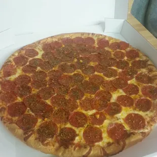 a pepperoni pizza in a box