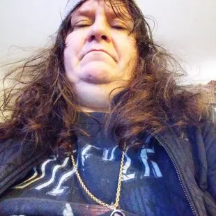 a woman with her eyes closed