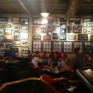 High, old tin ceilings &amp; Texas memorabilia line the dining room walls...