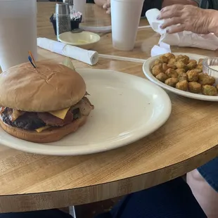 a hamburger and fries on a table