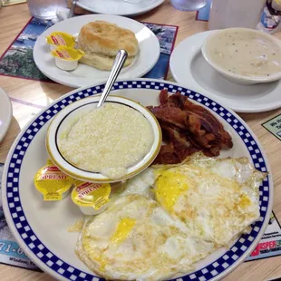 Eggs and bacon with grits and biscuit.  Added side of sausage gravy.  Very good!