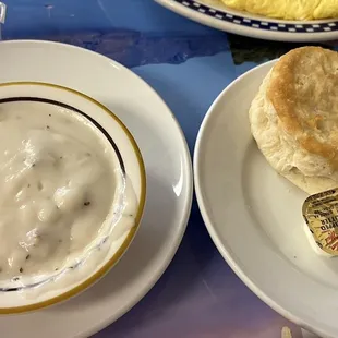 Gravy on the side with a biscuit