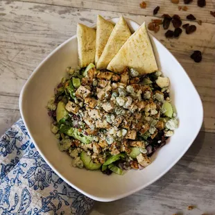 CRANBERRY WALNUT SALAD with grilled chicken, mixed lettuce, bleu cheese crumbles, red onion, cucumber, candied walnuts &amp; dried cranberry