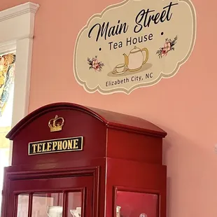 Telephone booth curio cabinet