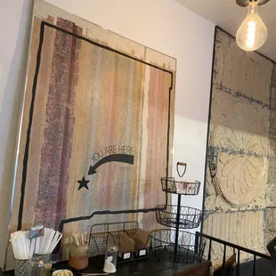 an old dresser and a painting