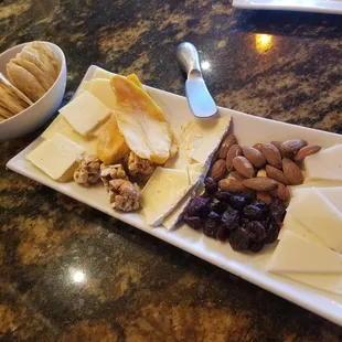 Cheese plate. Cheddar, triple cream brie, manchego.
