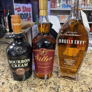 three bottles of liquor