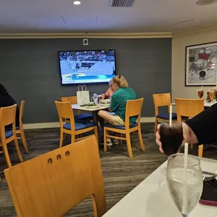 a man and a woman sitting at a table
