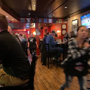 people sitting at the bar