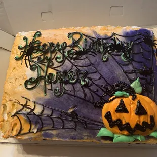 The cake we received, plus spiders I added
