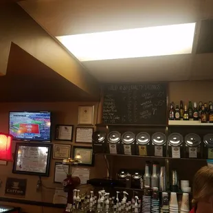 a woman sitting at the bar