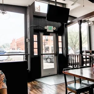 a man sitting at a table in a restaurant