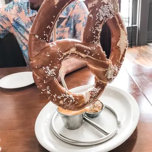 Giant hanging pretzel on appetizer menu. It was really good and the cheese is incredible!
