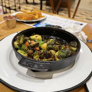 Brussels sprouts with bacon or some ham not sure but it was good.