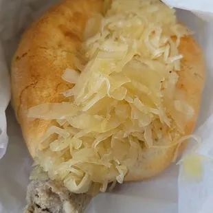 a sausage and sauerkraut wrapped in foil