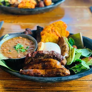 Bandeja Paisa....my favorite! The meat was perfectly seasoned, perfect crips to the pork belly...DELICIOUS! I can&apos;t wait to have this again.