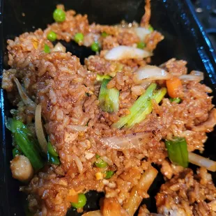 Fried rice. Had to much soy sauce  and it stuck together like.