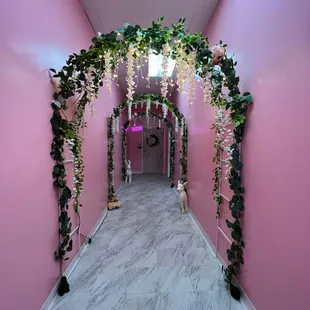 Arches leading to bathrooms