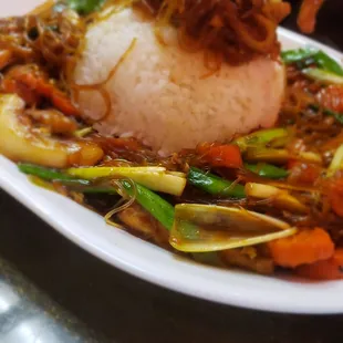 (noodles did not come on top of the rice bowl) . Customer placed it their before picture.  Meal for 2-3 people/meals.