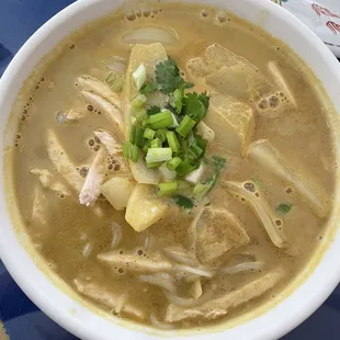 Coconut Curry soup with chicken. The broth is GOALS! Spicy and a bit sweet from coconut milk.