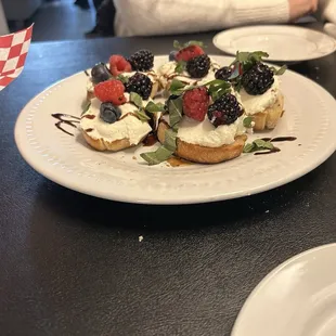 Honey and berry on crostini