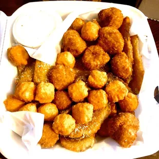 Appetizer sampler platter, featuring cheese balls, breaded mushrooms, and breaded zucchini