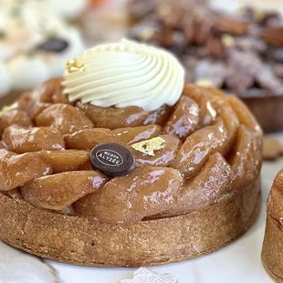 Apple Pie: hand-made Muscovado shell with almond cream &amp; house-made organic apple compote. hint of cinnamon, mascarpone whipped cream!