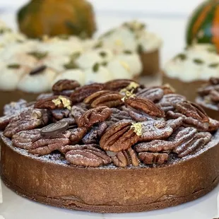 Pecan Pie: Muscovado shell ,house-made pecan cream. Revel in the sweet crunch of caramelized pecan  glazed with maple syrup!