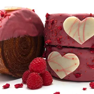 Valentine Croissant Roll filled with salted caramel, dipped in Valrhona raspberry chocolate . Topped with white chocolate dried raspberries