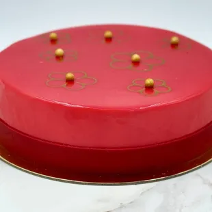 A Limited Edition - Lunar New Year cake On Madeleine biscuit, A Litchi cremeux, A soft Grapefruit confit, and a "Timut