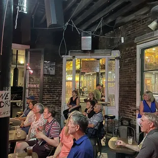 Interior shot of patrons listening to live jazz