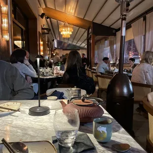 Enclosed indoor/outdoor seating.