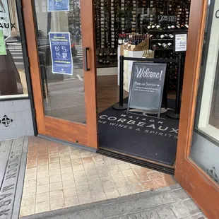 the entrance to a wine shop